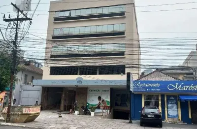 Escritório à venda no bairro Auxiliadora com área útil de 51m² disponível para compra