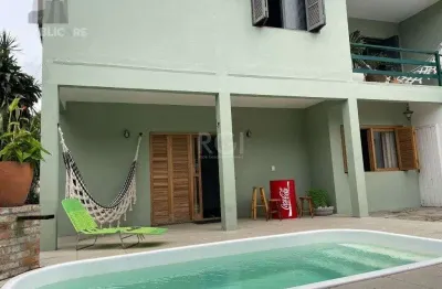 Casa residencial à venda, 3 dormitórios no bairro Nonoai, área de 260 m².