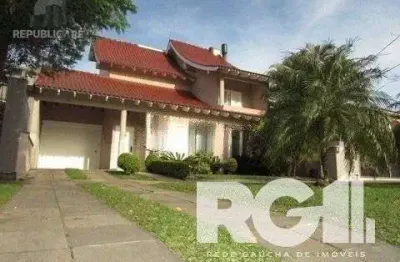 Casa residencial à venda no bairro Marechal Rondon com 3 dormitórios e 390 m² de área.