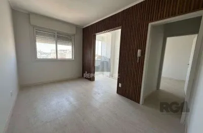 Apartamento à venda no centro com 1 dormitório e 41 m² de área útil.