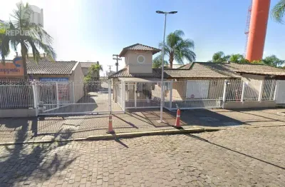 Casa de condomínio à venda com 3 dormitórios no bairro Humaitá e 77 m² de área útil