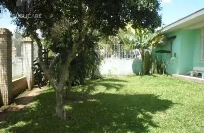 Casa residencial à venda no bairro Rubem Berta com 318 m² e 3 dormitórios/quartos.