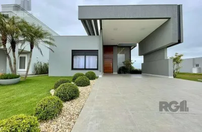 Casa de condomínio à venda no bairro Centenário com 220 m² e 3 dormitórios/quartos.