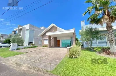 Casa de condomínio à venda no bairro Atlântida Sul com 3 dormitórios/quartos e 164m²
