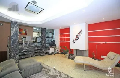 Casa de condomínio à venda no bairro Sarandi com 320 m² e 3 dormitórios/quartos.