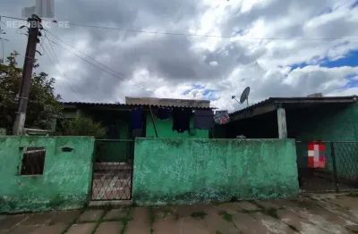 Casa residencial à venda no bairro Restinga com 3 dormitórios/quartos e 90 m².