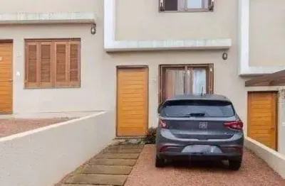 Casa de condomínio à venda no bairro Nonoai com 124 m² e 2 dormitórios/quartos.