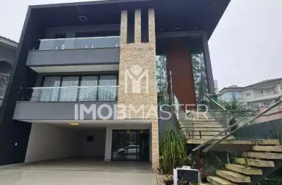 Casa de condomínio com 452 m², 4 quartos sendo 4 suítes à venda no bairro terra nova ii.