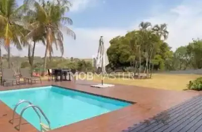 Casa de condomínio com 338 m², oportunidade rara de adquirir um imóvel pronto, casa térrea com 5 suítes, espaçoso e cheio de charme