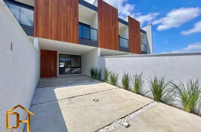 Sobrado geminado com 1 suíte mais 2 quartos no bairro iririú