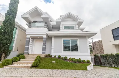 Casa em condomínio com 4 suiítes no bairro uberaba em curitiba