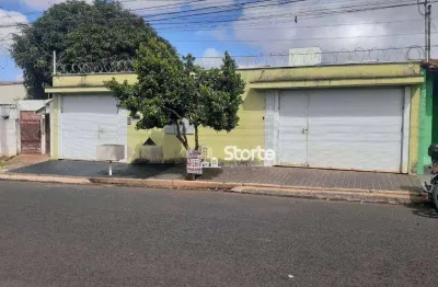 Terreno com 3 casas à venda, 320m² por r$ 780.000 - tibery - uberlândia/mg