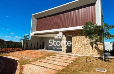 Casa com 4 dormitórios à venda, 318 m² por r$ 3.700.000,00 - condomínio golden village - jardim sul - uberlândia/mg