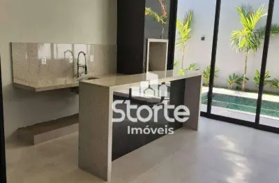 Casa com 3 dormitórios à venda, 242 m² por r$ 2.200.000,00 - condomínio alphaville 1 - uberlândia/mg