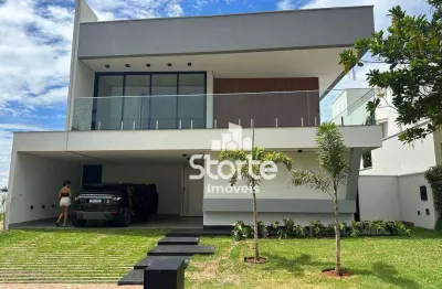 Excelente casa com 4 dormitórios à venda, 300 m² por r$ 2.700.000 - condomínio alphaville 1 - uberlândia/mg