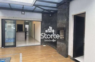 Maravilhosa casa com piscina e varanda gourmet e com 3 suítes à venda, 170m² por r$ 990.000 - jardim patrícia - uberlândia/mg