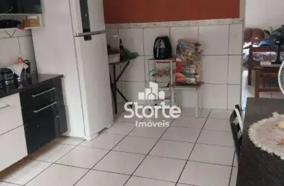 São duas casas em único terreno à venda, 110m² por r$ 390.000 - jardim brasília - uberlândia/mg