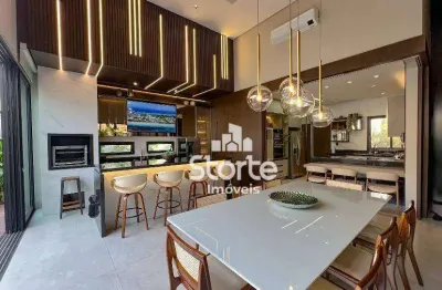 Casa térrea com 3 suítes à venda, 220m² por r$ 3.000.000 ou r$ 3.100.000 com porteira fechada - condomínio jardim versailles - uberlândia/mg