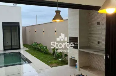 Casa com 3 dormitórios à venda, 150 m² por r$ 1.190.000,00 - condomínio raros alto umuarama - uberlândia/mg