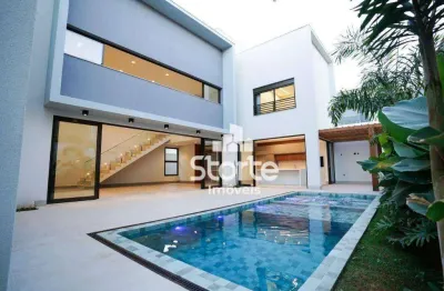 Casa alto padrão estilo sobrado com 4 suítes à venda, 300m² por r$ 3.550.000 - condomínio jardim versailles - uberlândia/mg