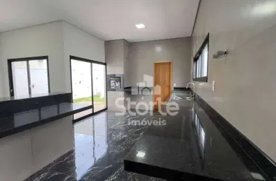 Casa estilo sobrado com 3 suítes à venda, 221m² por r$ 1.600.000 - condomínio terras alpha - uberlândia/mg