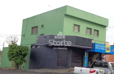 Ponto de esquina com 02 cômodos comerciais + apartamento + casa à venda, 230m² de área construída por r$ 1.150.000 - daniel fonseca - uberlândia/mg