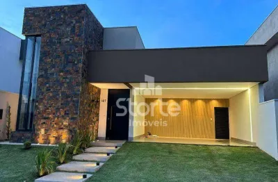 Casa com 3 dormitórios à venda, 194 m² por r$ 1.800.000 - condomínio reserva dos ipês - uberlândia/mg