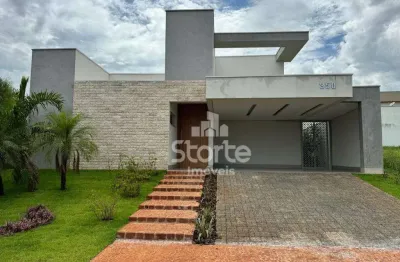 Casa com 4 dormitórios para alugar, 230 m² por r$ 12.000,00/mês - condomínio alphaville 1 - uberlândia/mg