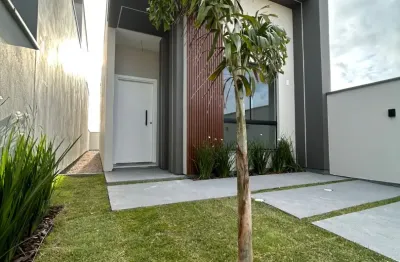 Linda casa à venda no flora flora, bairro joaoa em tijucas/sc com passagem lateral e churrasqueira