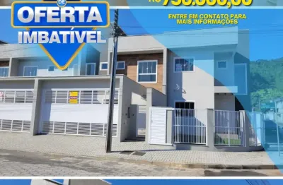 Sobrado geminado com ótimo padrão no bairro amizade