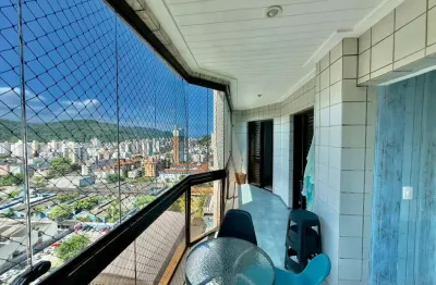 Apartamento à venda na praia da enseada, 3 quartos, 2 vagas.