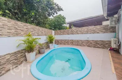 Casa em condomínio fechado com 4 quartos à venda na estrada joão salomoni, 600, vila nova, porto alegre, 191 m2 por r$ 890.000