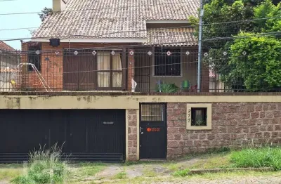 Casa com 3 quartos à venda na avenida deputado aramy silva, 277, santa tereza, porto alegre, 154 m2 por r$ 945.000