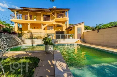 Casa com 4 quartos à venda na rua maurílio ferreira, 320, campo novo, porto alegre, 320 m2 por r$ 1.850.000