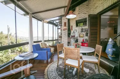 Casa em condomínio fechado com 4 quartos à venda na rua erechim, 100, nonoai, porto alegre, 331 m2 por r$ 1.050.000