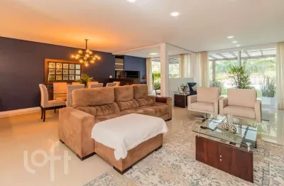 Casa em condomínio fechado com 4 quartos à venda na avenida juca batista, 8000, belém novo, porto alegre, 297 m2 por r$ 1.850.000