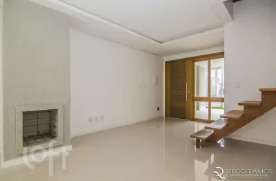 Casa em condomínio fechado com 3 quartos à venda na rua pau brasil, 43, hípica, porto alegre, 140 m2 por r$ 560.000
