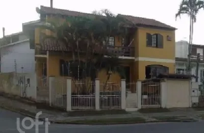 Casa com 3 quartos à venda na avenida celestino bertolucci, 115, hípica, porto alegre, 306 m2 por r$ 979.900