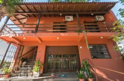 Casa com 4 quartos à venda na avenida dos prazeres, 886, vila jardim, porto alegre, 528 m2 por r$ 1.570.000