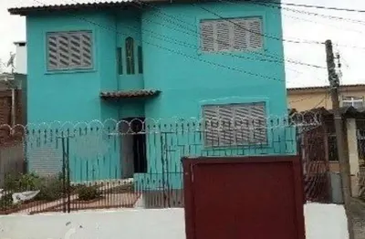 Casa com 4 quartos à venda na avenida delmar rocha barbosa, 729, rubem berta, porto alegre, 220 m2 por r$ 530.000