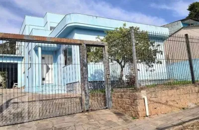 Casa com 5 quartos à venda na rua leão licurgo brasiliano arano, 125, vila nova, porto alegre, 312 m2 por r$ 850.000