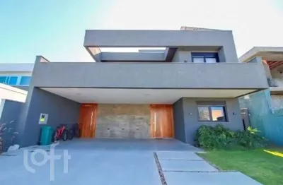 Casa em condomínio fechado com 4 quartos à venda na avenida juca batista, 9000, belém novo, porto alegre, 450 m2 por r$ 3.550.000