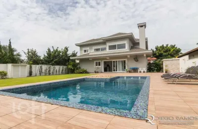 Casa em condomínio fechado com 5 quartos à venda na avenida juca batista, 8000, belém novo, porto alegre, 413 m2 por r$ 3.600.000
