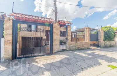 Casa com 4 quartos à venda na rua xavier da cunha, 581, nonoai, porto alegre, 193 m2 por r$ 689.000