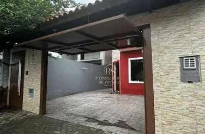 Casa com 2 dormitórios à venda, 140 m² por R$ 700.000 - Jundiapeba - Mogi das Cruzes/SP