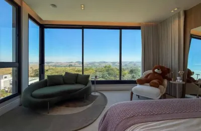 Belíssimo sobrado no condomínio jaguary com 4 dormitórios à venda - porteira fechada, 450 m² por r$ 5.900.000 - são josé dos campos/sp