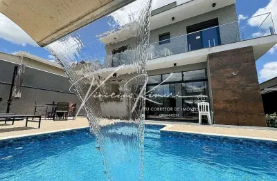 Ótima sobrado com 3 suítes no condomínio terras de atibaia i
