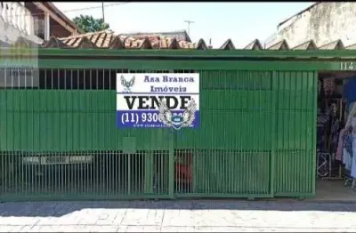 Casa térrea, com  com 04 dormitórios e 03 vagas de garagem e uma edícula