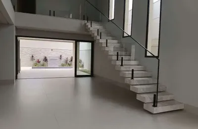 Sobrado com 3 dormitórios à venda, 253 m² por r$ 1.900.000,00 - jardins bolonha - senador canedo/go