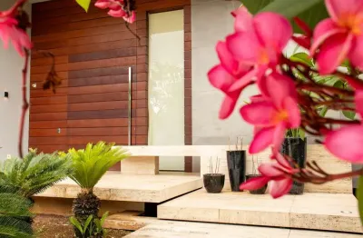 Casa de 457,49 m² com 04 suítes para alugar por r$ 35.000,00 - alphaville res. cruzeiro do sul - goiânia-go.